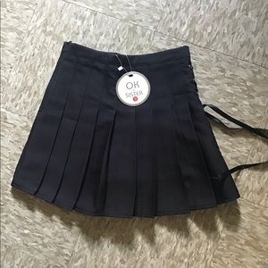 Black pleated skirt with side detail in size small